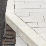 tobermore-manhattan-silver-graphite-textured-kerb-natural_lit-building-coonagh-cross-limerick-1-1-1024x768
